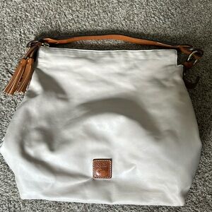 Dooney and Bourke Eggshell Wexford leather hobo shoulder bag